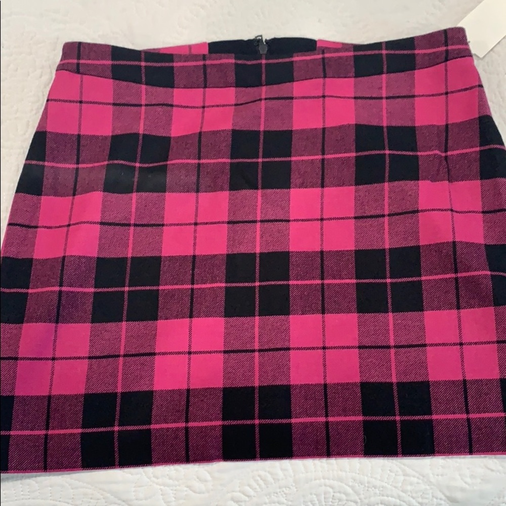 Get ready for fall!  Pink and black miniskirt 💕